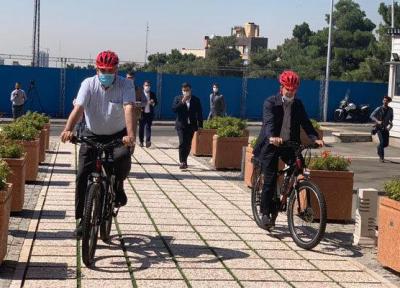 شهردار تهران با دوچرخه به کمیته المپیک رفت