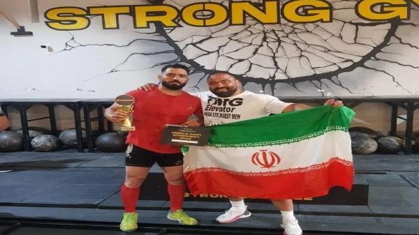 نشان طلای رقابت های بین المللی قویترین مردان بر گردن ورزشکار کردستانی
